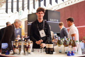 Friendly bar staff at booth at the Money2020 event in the RAI